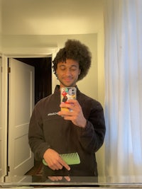 a man taking a selfie in a mirror